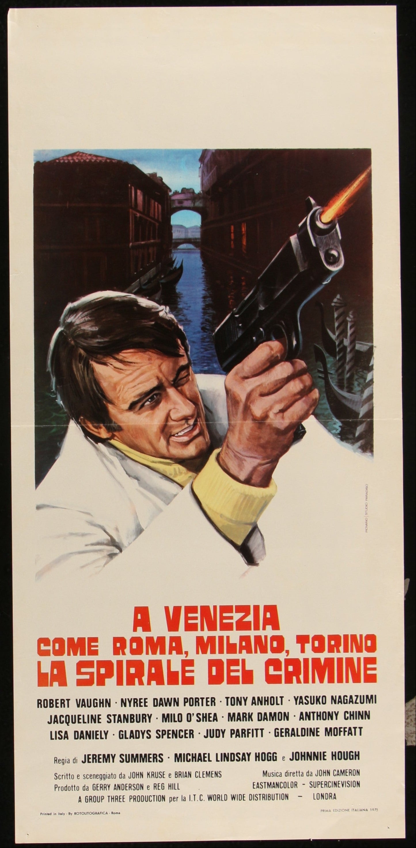 A vintage Italian movie posters with a dramatic scene and text.