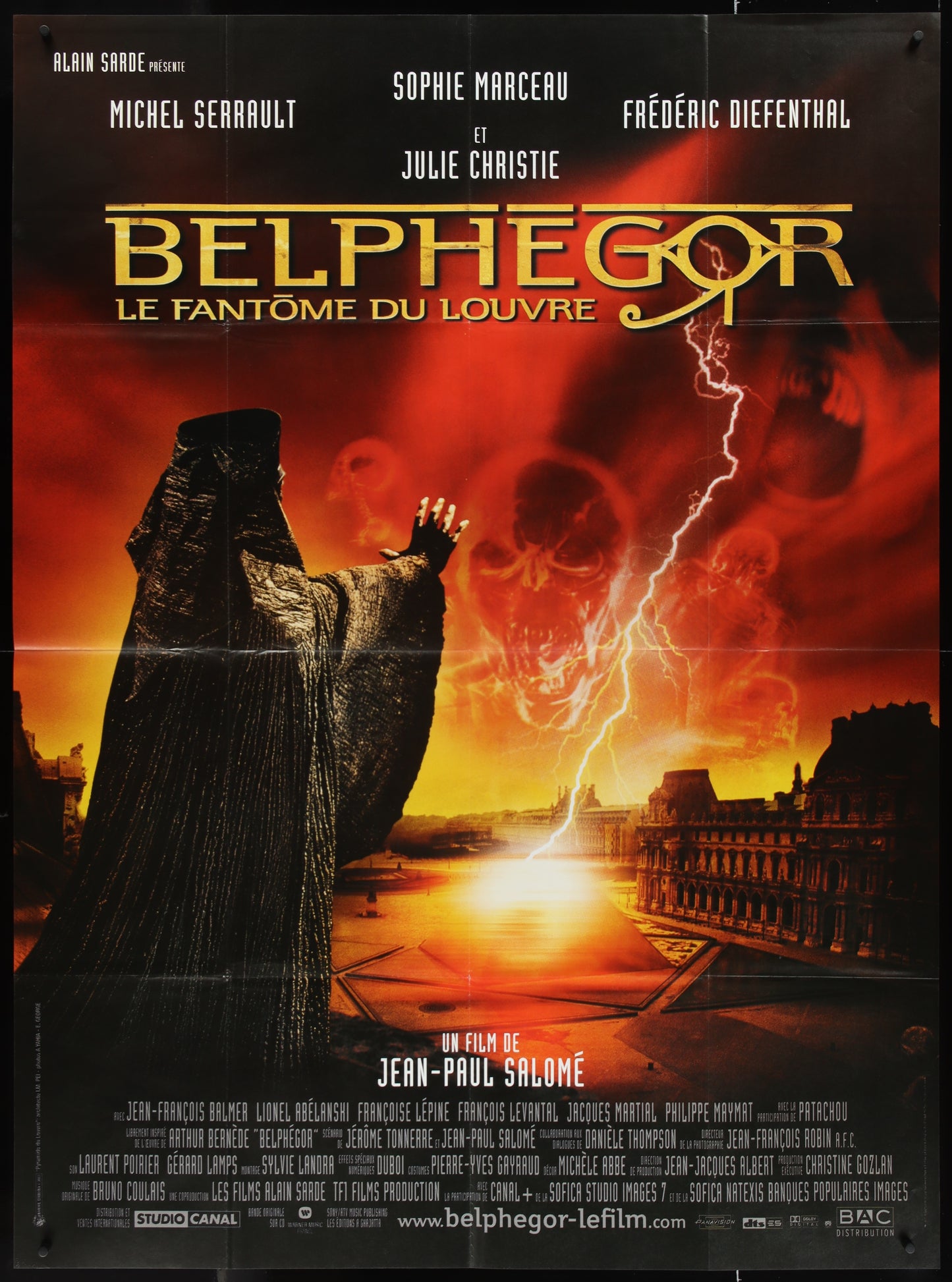 A vintage movie poster for 'Belphegor - Le Fantome du Louvre' featuring a dark silhouette of a character against a fiery background with a skull motif.