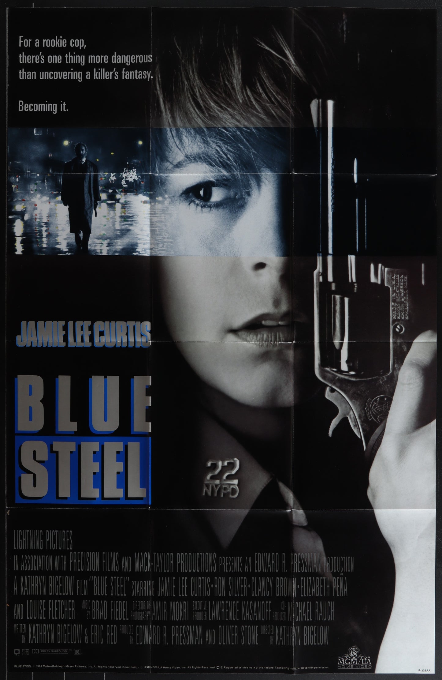 Movie poster for 'Blue Steel' featuring a woman holding a gun.
