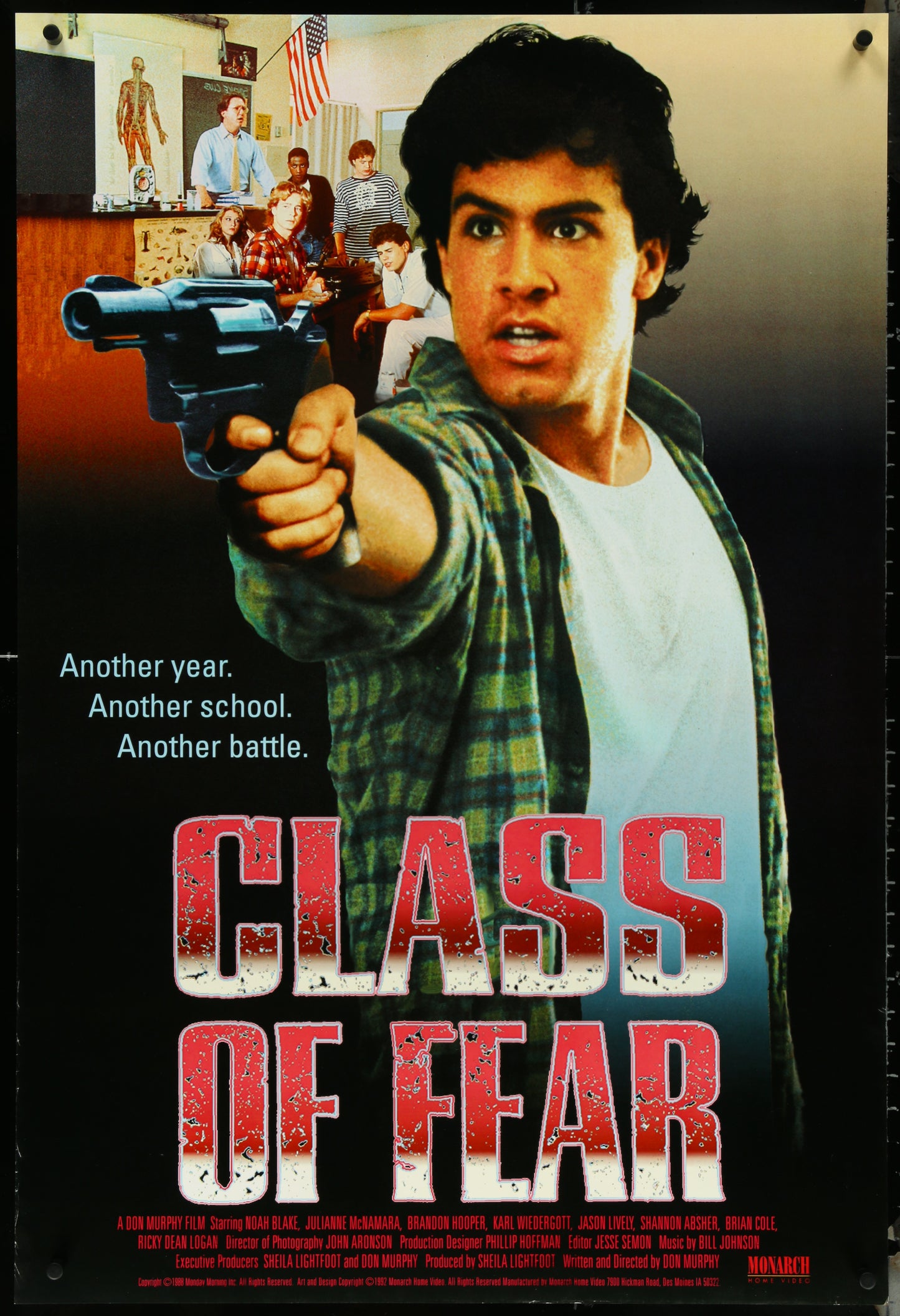 Original US video rental store poster for the movie 'Class Of Fear' featuring a man holding a gun, with the movie title prominently displayed.