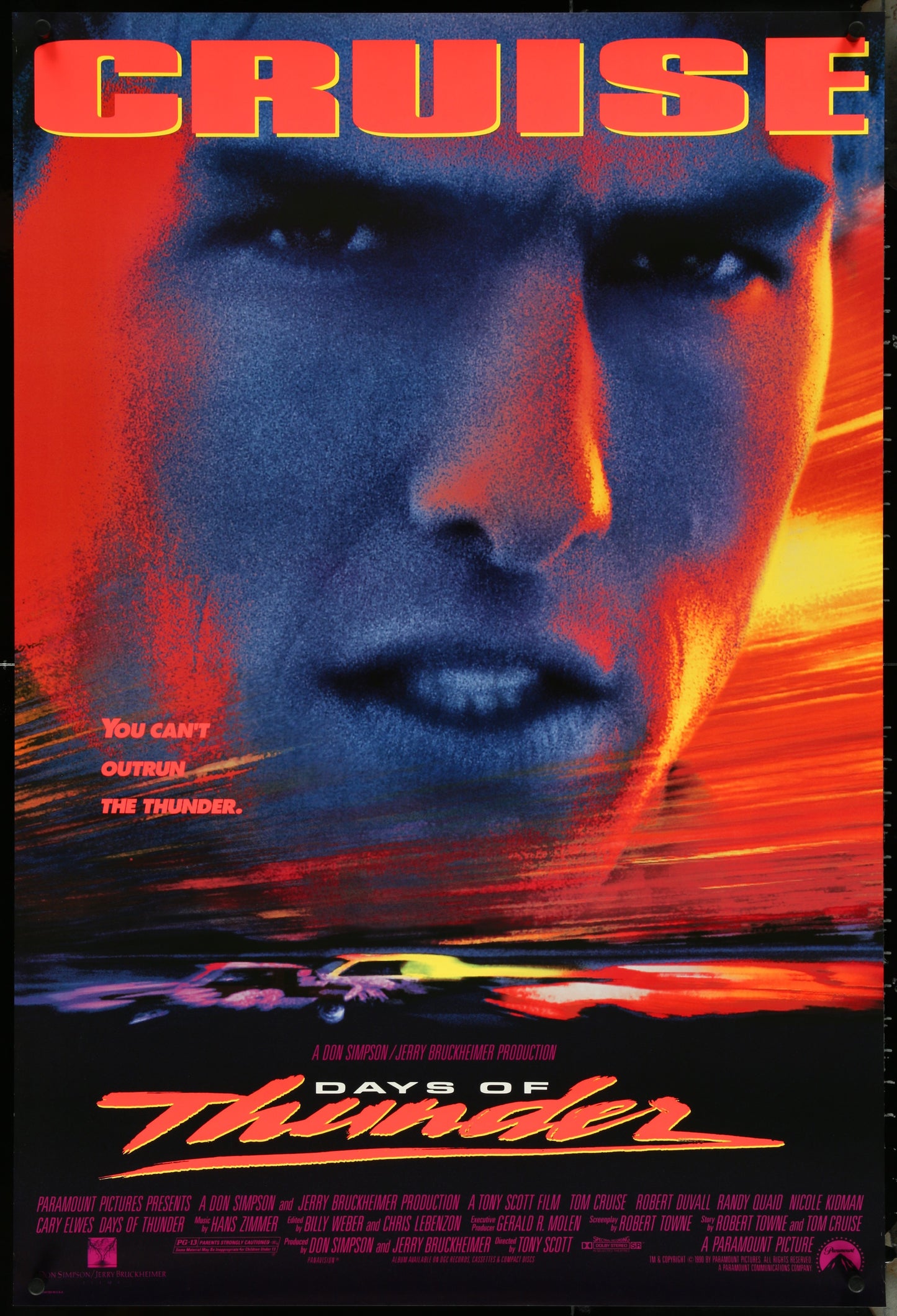 Movie poster for 'Days of Thunder' with a close-up of a Tom Cruise's face and text.