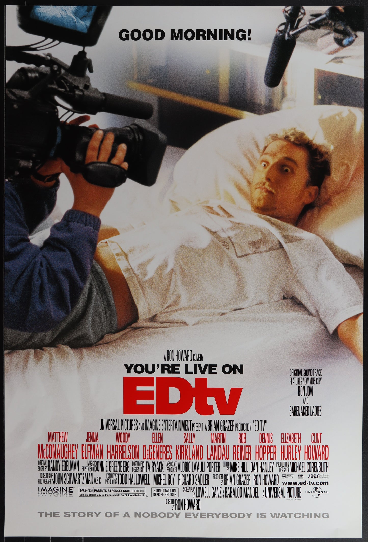 Movie poster for 'EDTV' showing a person in bed with a camera crew.