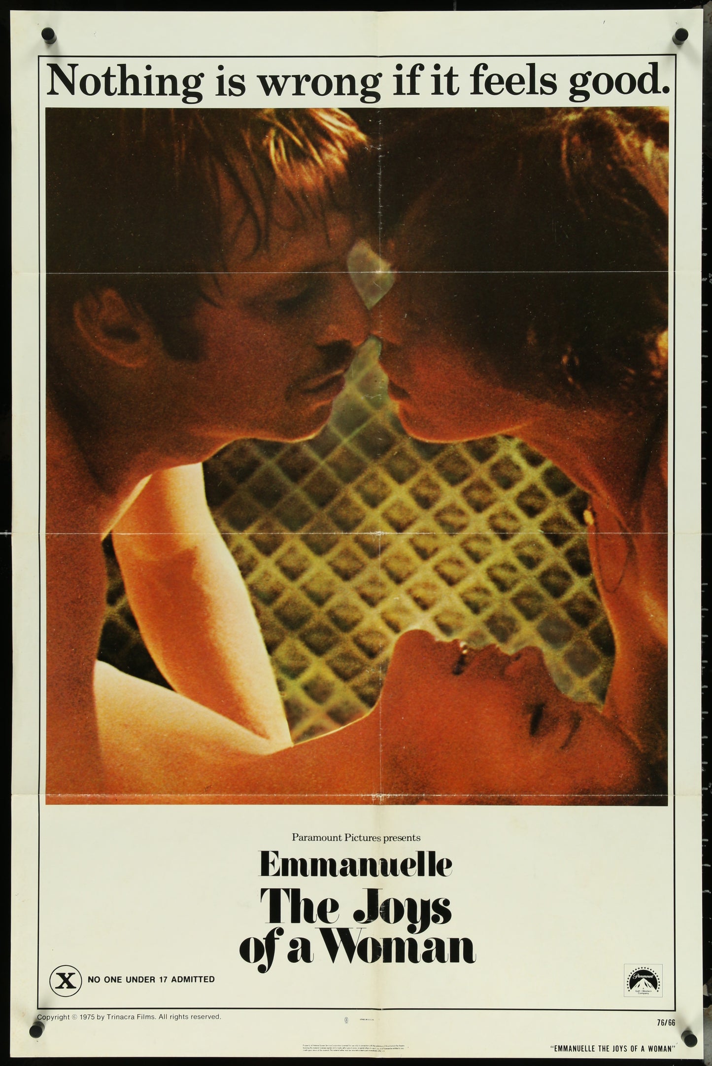 Original US one sheet movie poster for 'Emmanuelle - The Joys Of A Woman' featuring a close-up of two people kissing with the movie title and text at the top.