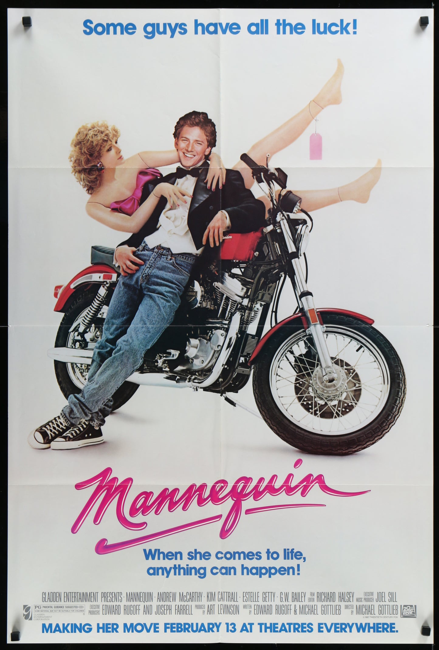 Vintage style movie poster featuring a man and a woman sitting on a motorcycle, with the title 'Mannequin' written below.