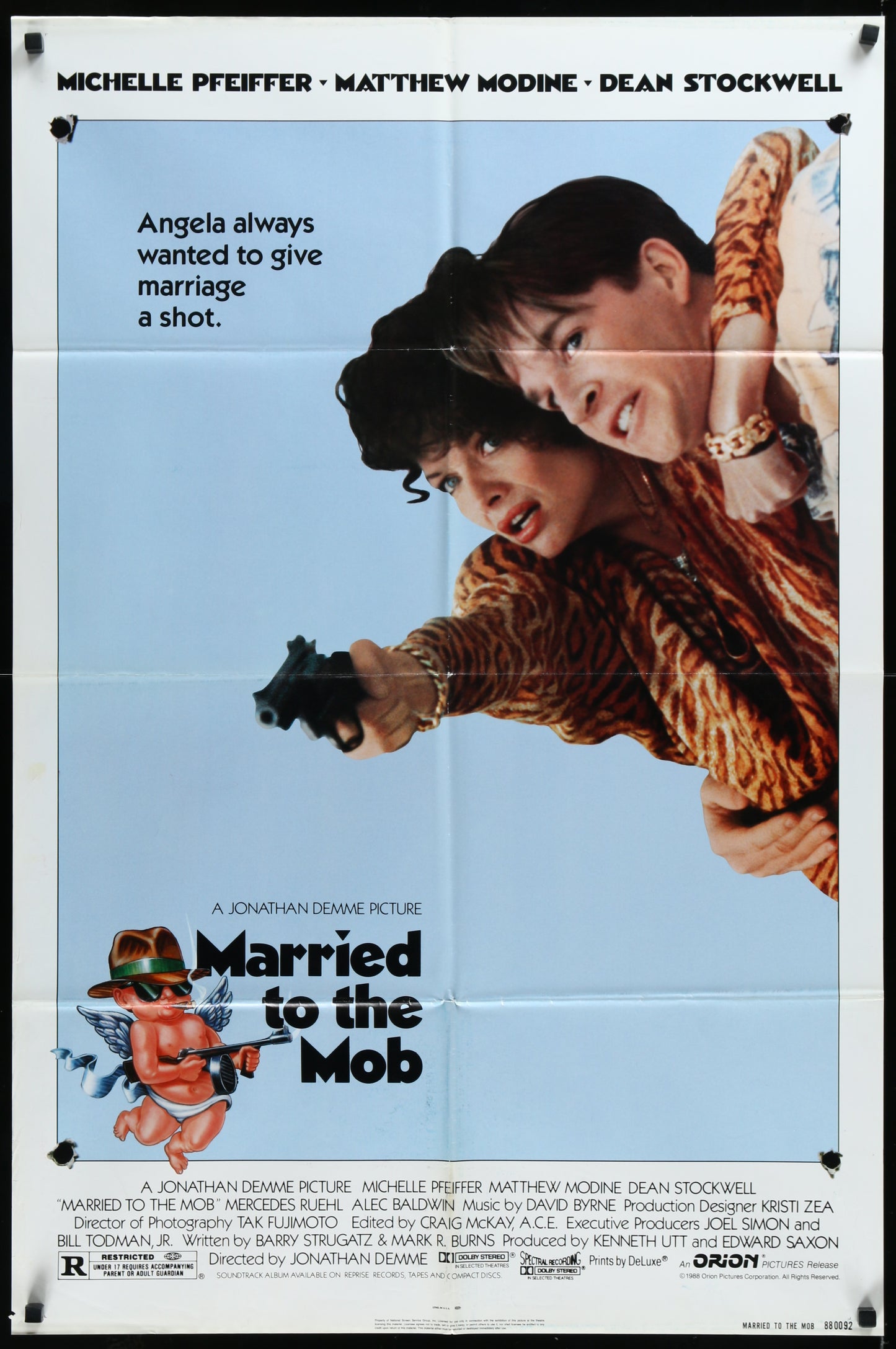 Original US one sheet movie poster for 'Married To The Mob' featuring images of the main characters with a dramatic background.