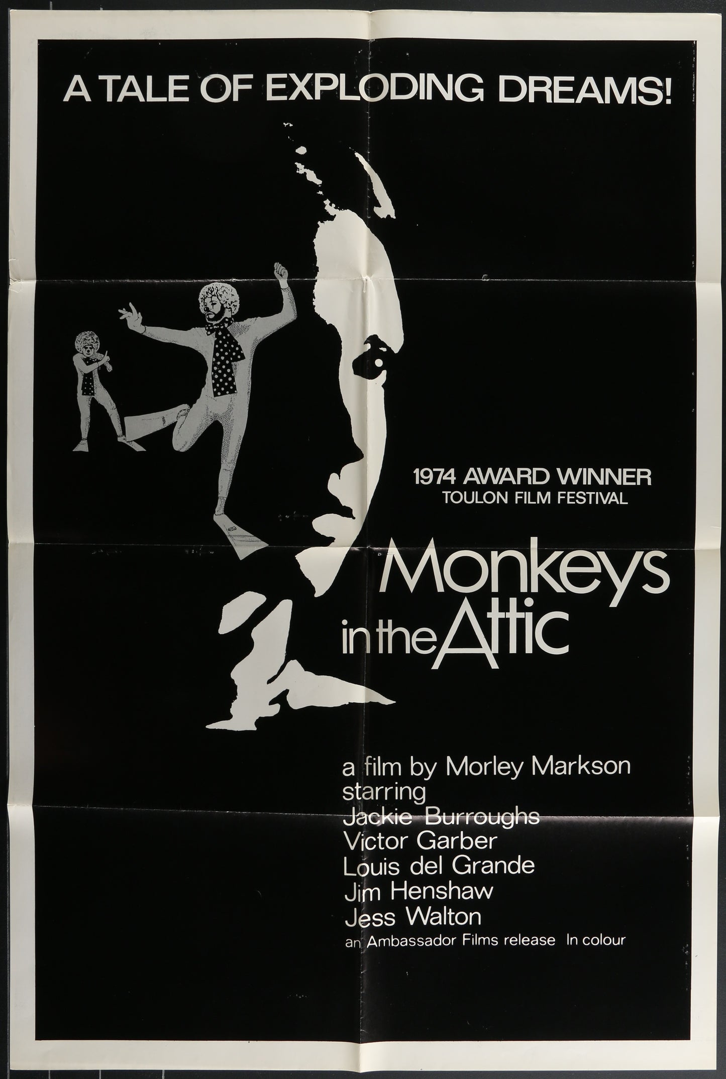 Vintage style black and white movie poster for 'Monkeys In The Attic' featuring a man and a woman in dramatic poses against a black background, with the text '1974 TAKE ONE FILM FESTIVAL AWARD WINNER' at the bottom.