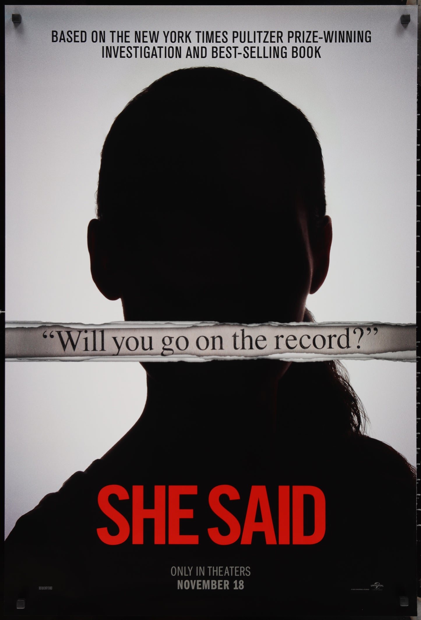 A movie poster for 'She Said' featuring a silhouette of a woman's face with text and a quote from the movie.