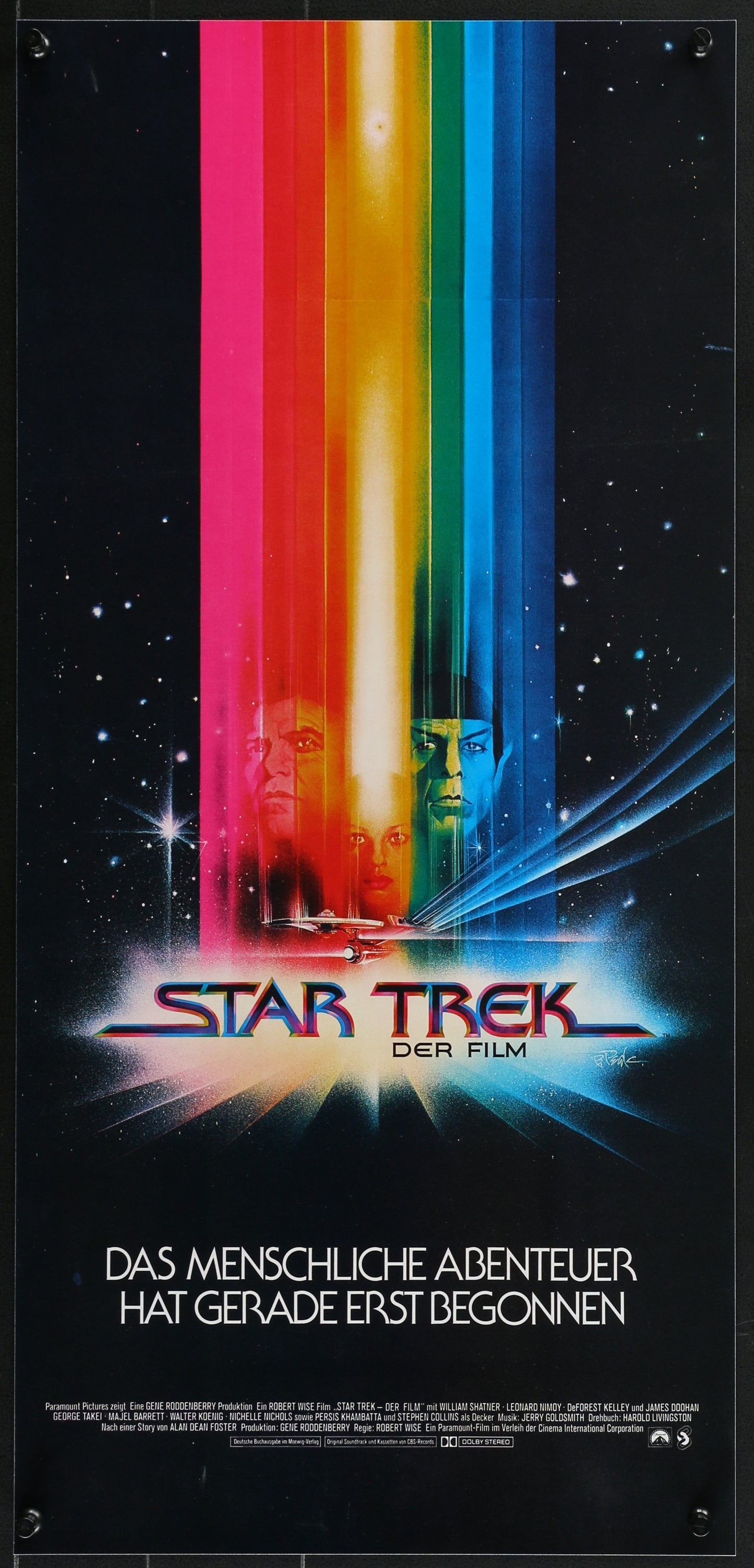 Vintage 'Star Trek' movie poster with colorful light effect and German text.