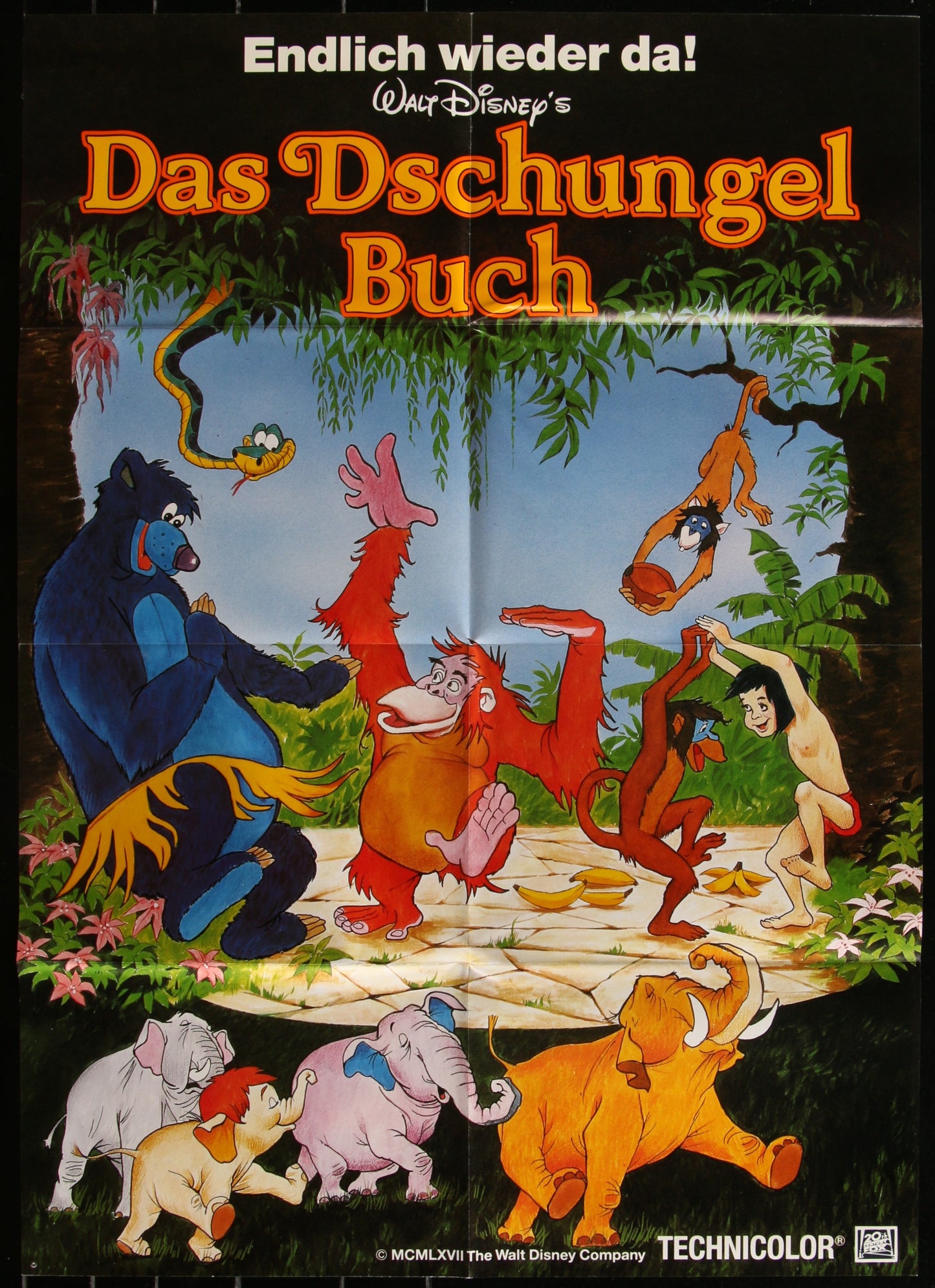 A colorful vintage movie poster for 'The Jungle Book' featuring animated characters in a jungle setting.