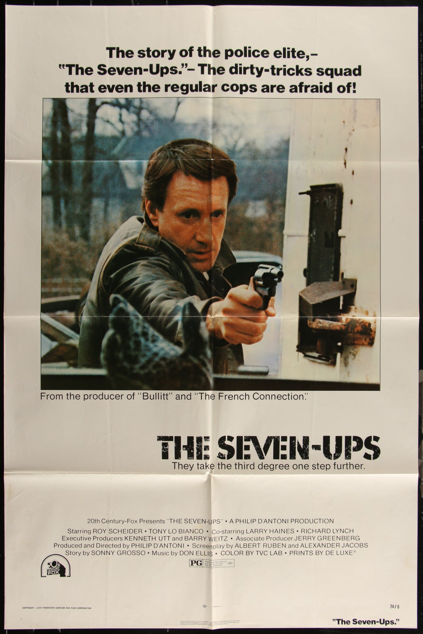 The image displays an original US one-sheet movie poster for the 1974 crime thriller "The Seven-Ups." Directed by Philip D'Antoni and starring Roy Scheider, the poster features a striking depiction of Scheider with a gun, emphasizing the film's action-packed and police-themed narrative.