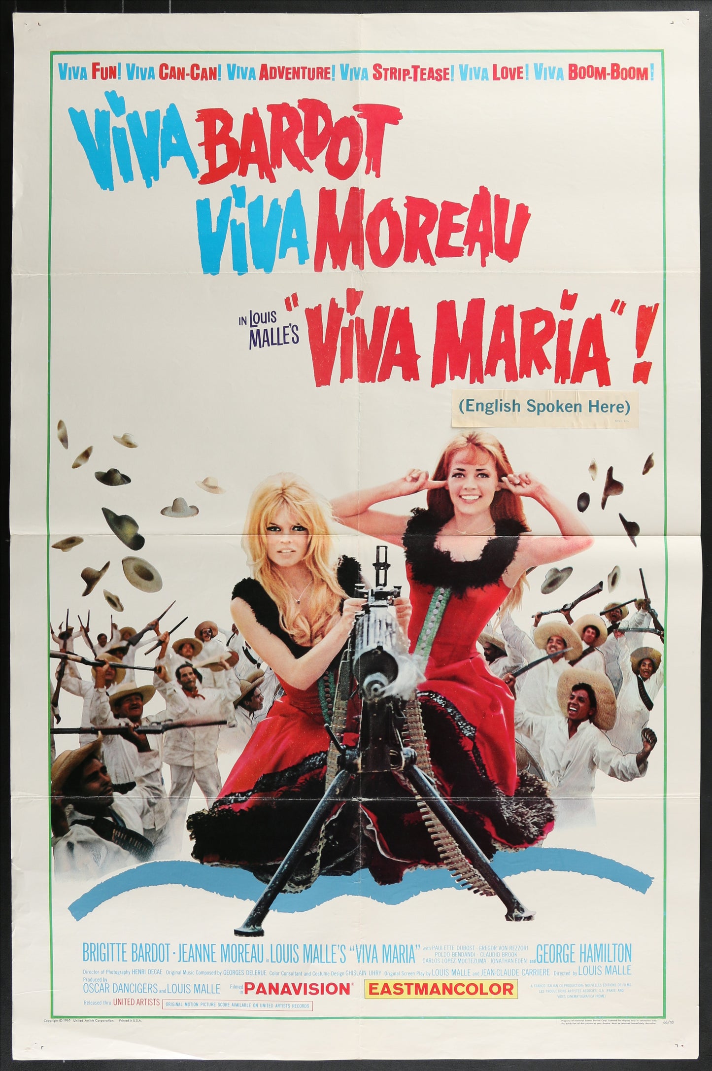 Vintage movie poster for 'Viva Maria!' featuring two women and a machine gun.