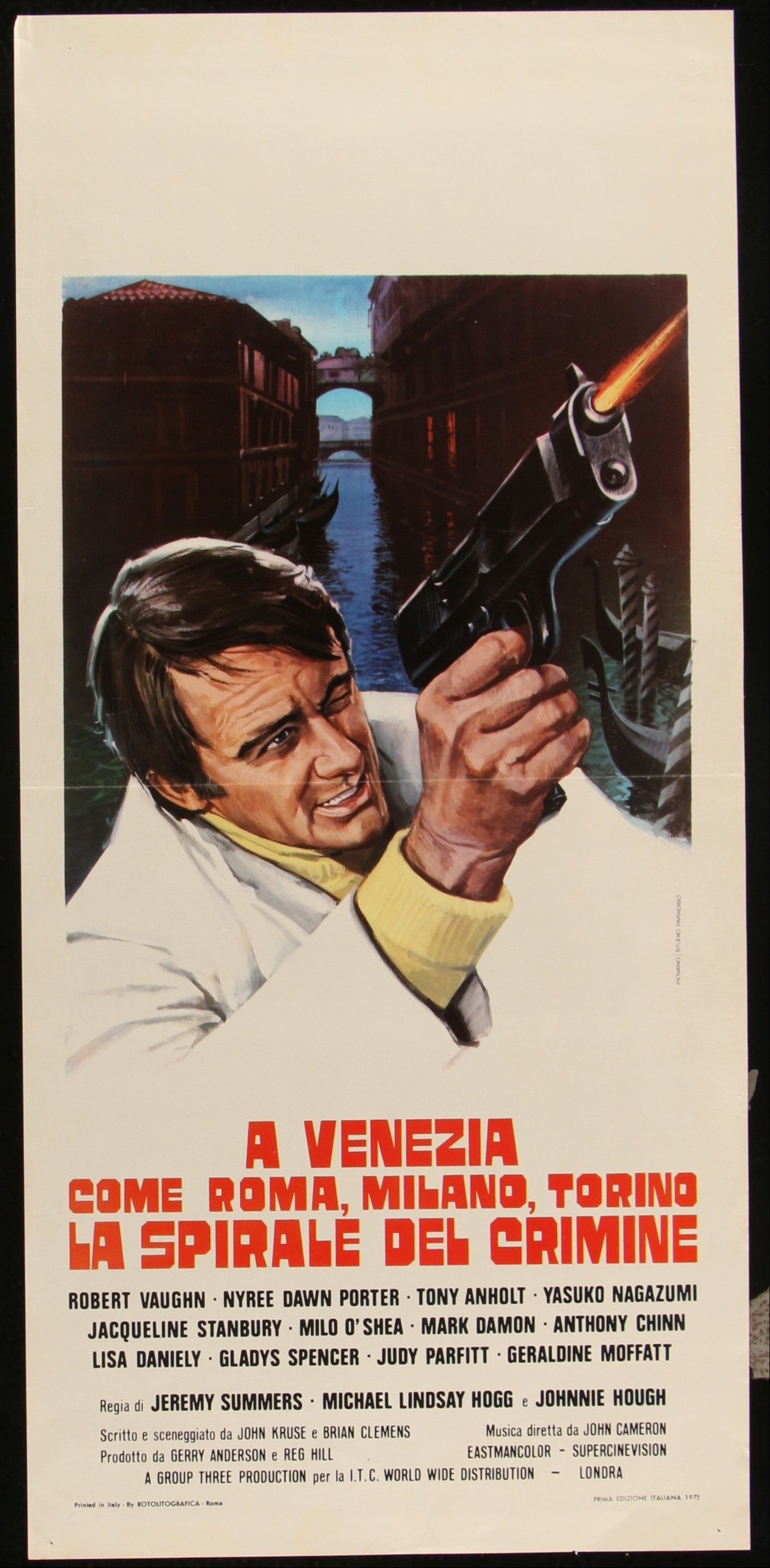 A vintage Italian movie posters with a dramatic scene and text.