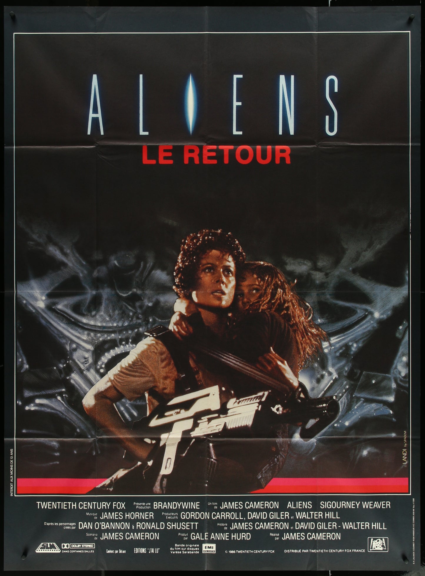 A vintage French one-panel movie poster for the film 'Aliens' featuring characters from the movie with the title 'Le Retour' at the top.