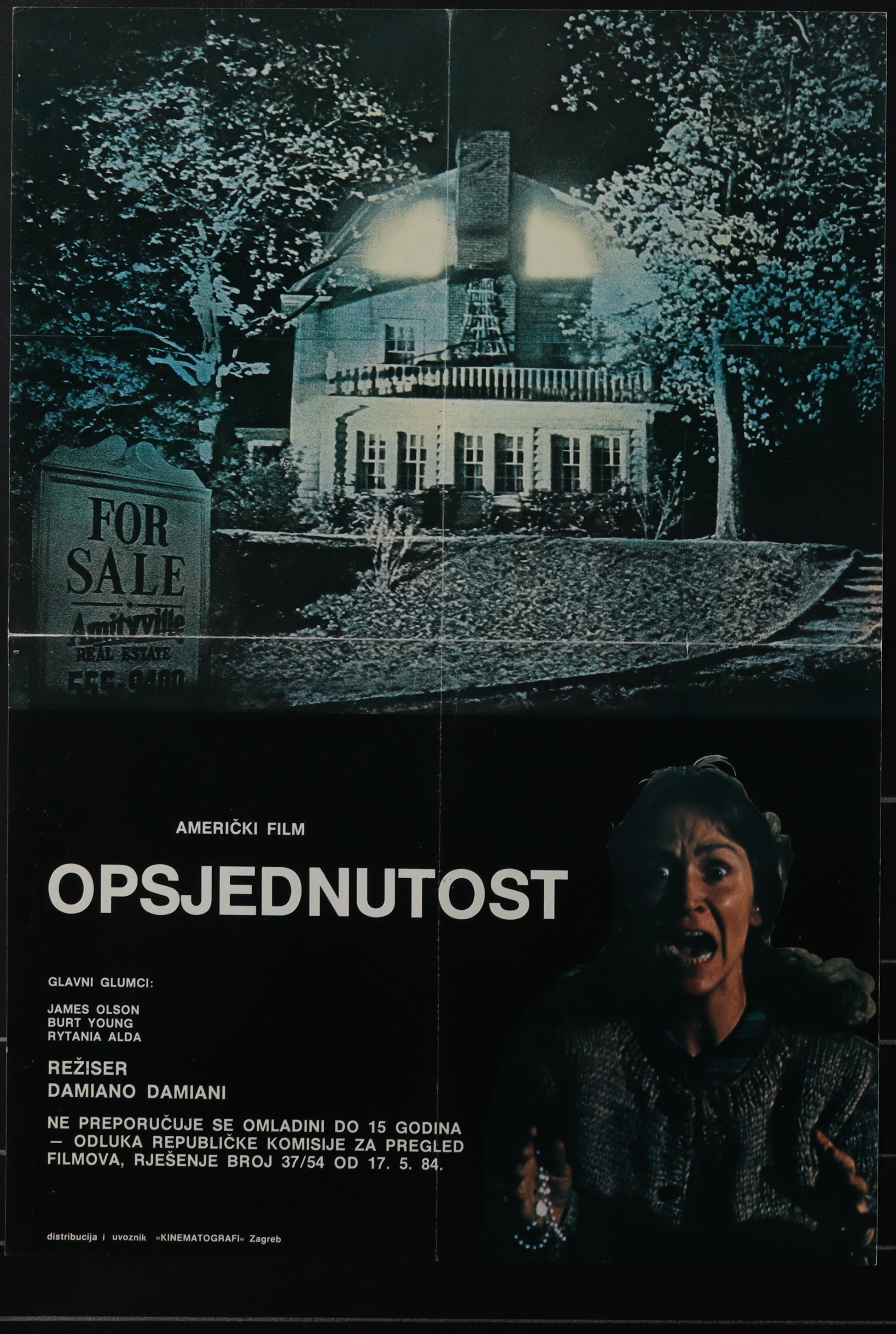 Original Yugoslavian movie poster for Amityville II featuring a house with a 'For Sale' sign in the background and a man's face in the foreground.