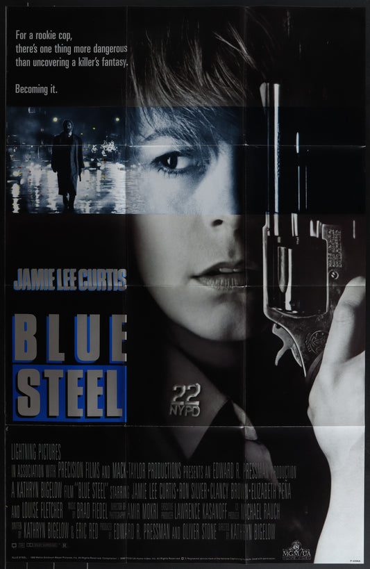 Movie poster for 'Blue Steel' featuring a woman holding a gun.