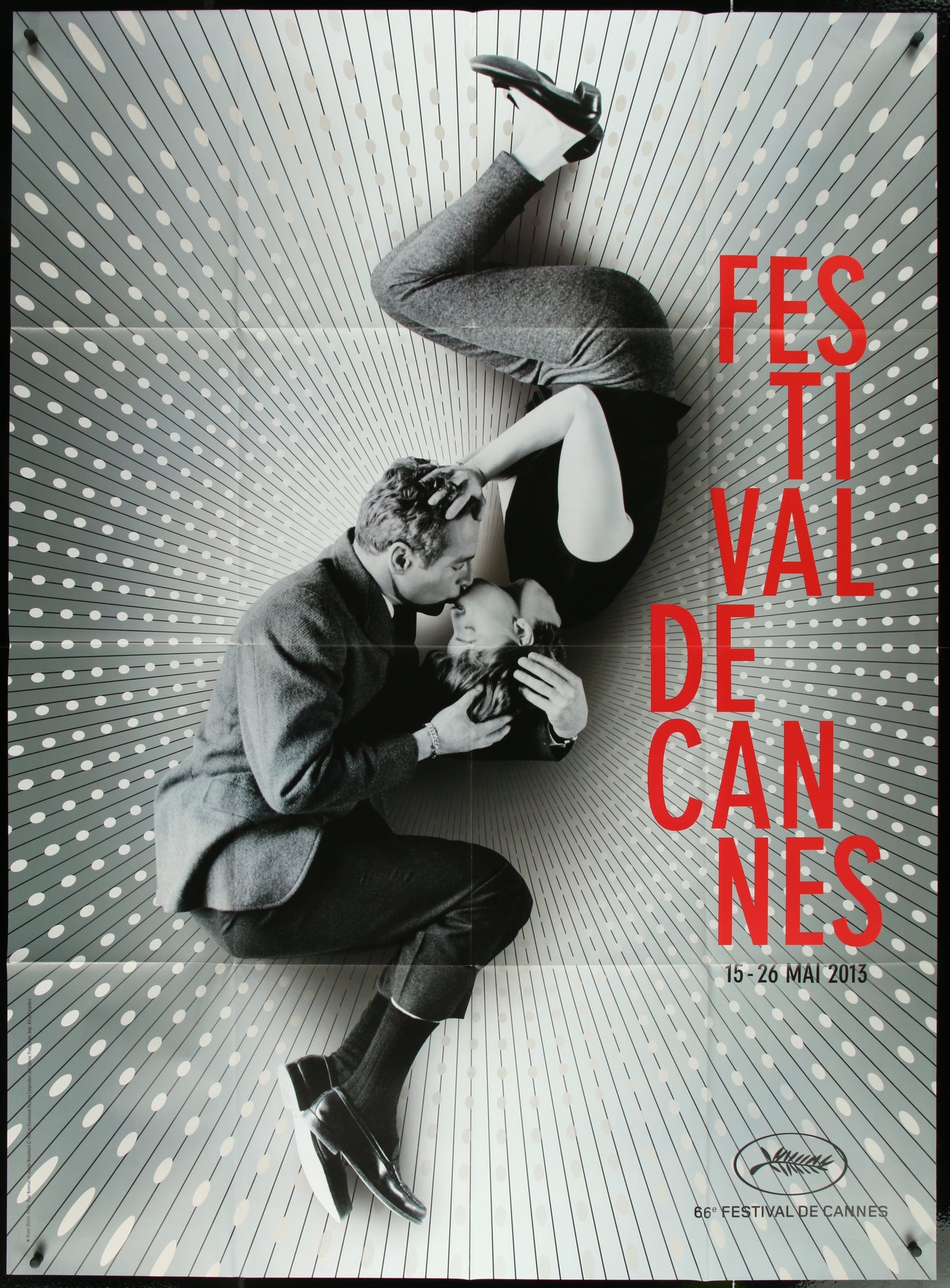 A vintage French one-panel poster for the Cannes Film Festival featuring an image of Paul Newman and Joanne Woodward from the film 'A New Kind of Love' with the Cannes Film Festival logo and the dates of the festival.