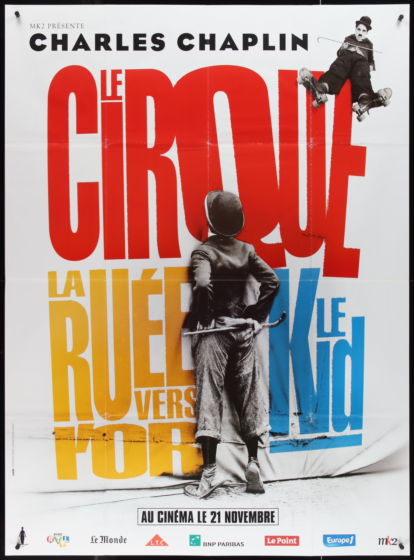 Vintage style movie poster featuring Charlie Chaplin with a red and yellow design, indicating a triple bill of his films including 'The Circus', 'The Gold Rush', and 'The Kid'.