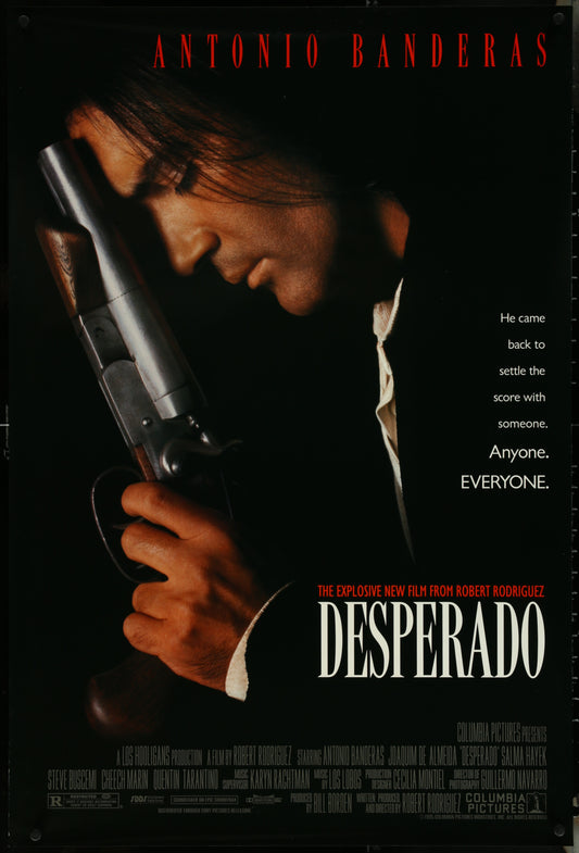 Movie poster for 'Desperado' featuring Antonio Banderas holding a gun.