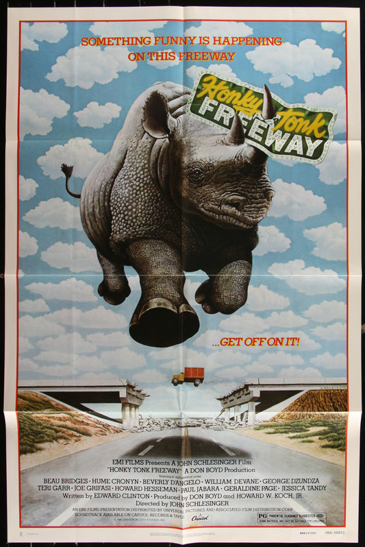 Vintage style movie poster for 'Honky Tonk Freeway' featuring a rhinoceros with a 'Honky Tonk' sign in the background, driving down a road with a blue sky and white clouds in the background. The poster is folded and shows some wear.