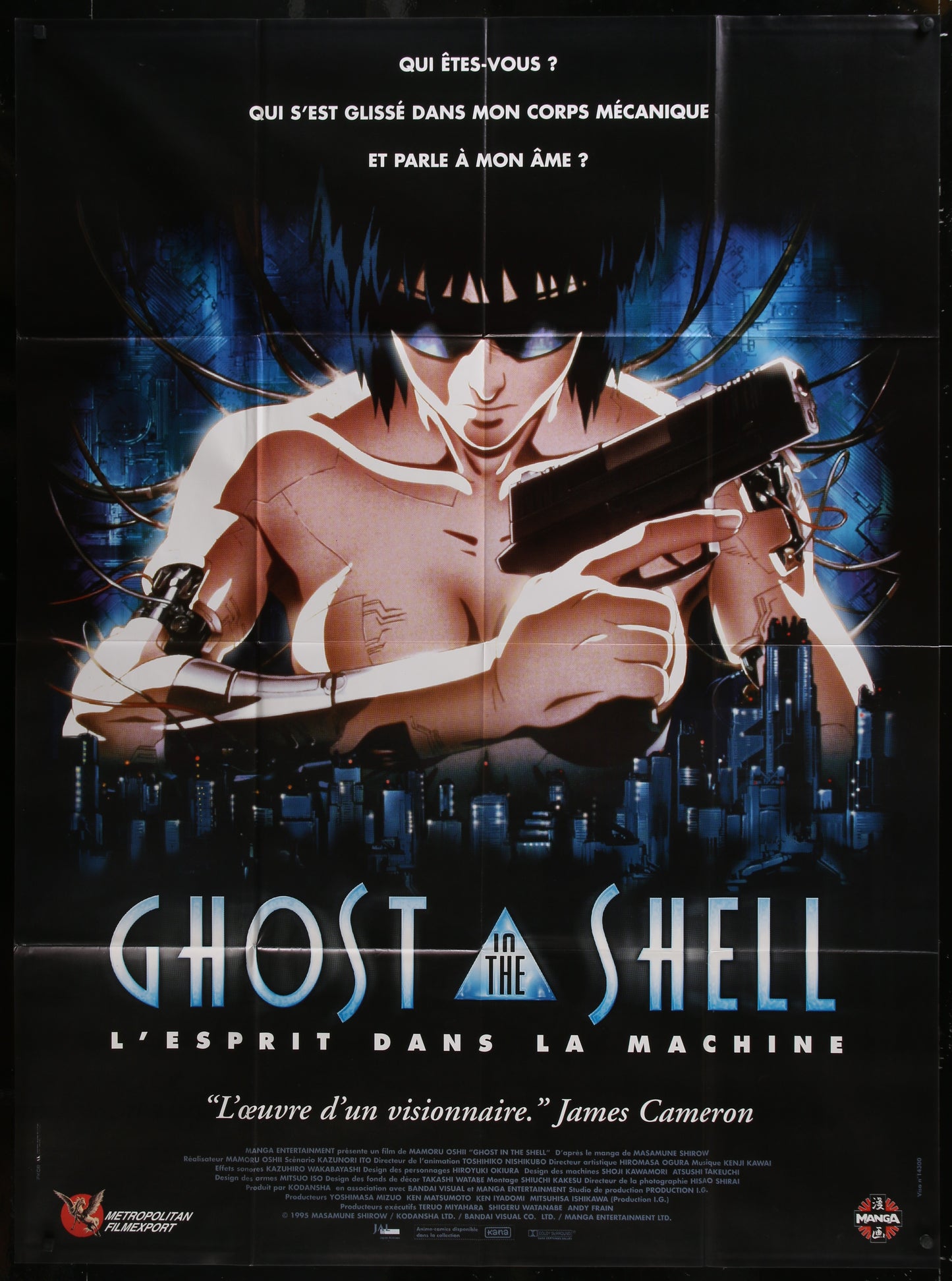 Movie poster for 'Ghost in the Shell' featuring a character holding a gun with a cityscape in the background.