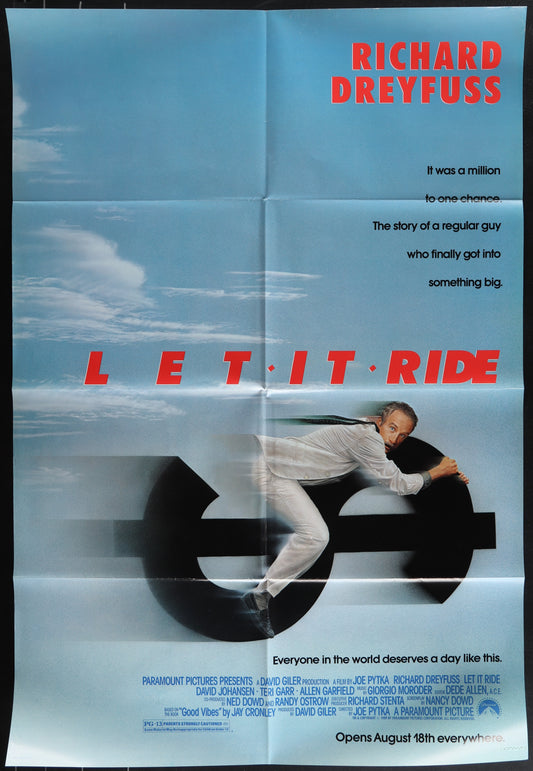 Movie poster for 'Let It Ride' featuring Richard Dreyfuss on a blue background with text.