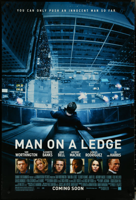 Original US one-sheet movie poster for 'Man On A Ledge' featuring a black and white image of the main character in a dramatic pose with a cityscape in the background.