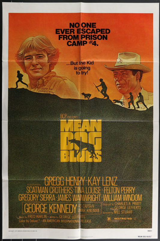 Vintage style movie poster for 'Mean Dog Blues' featuring images of the main characters with a dramatic landscape background.