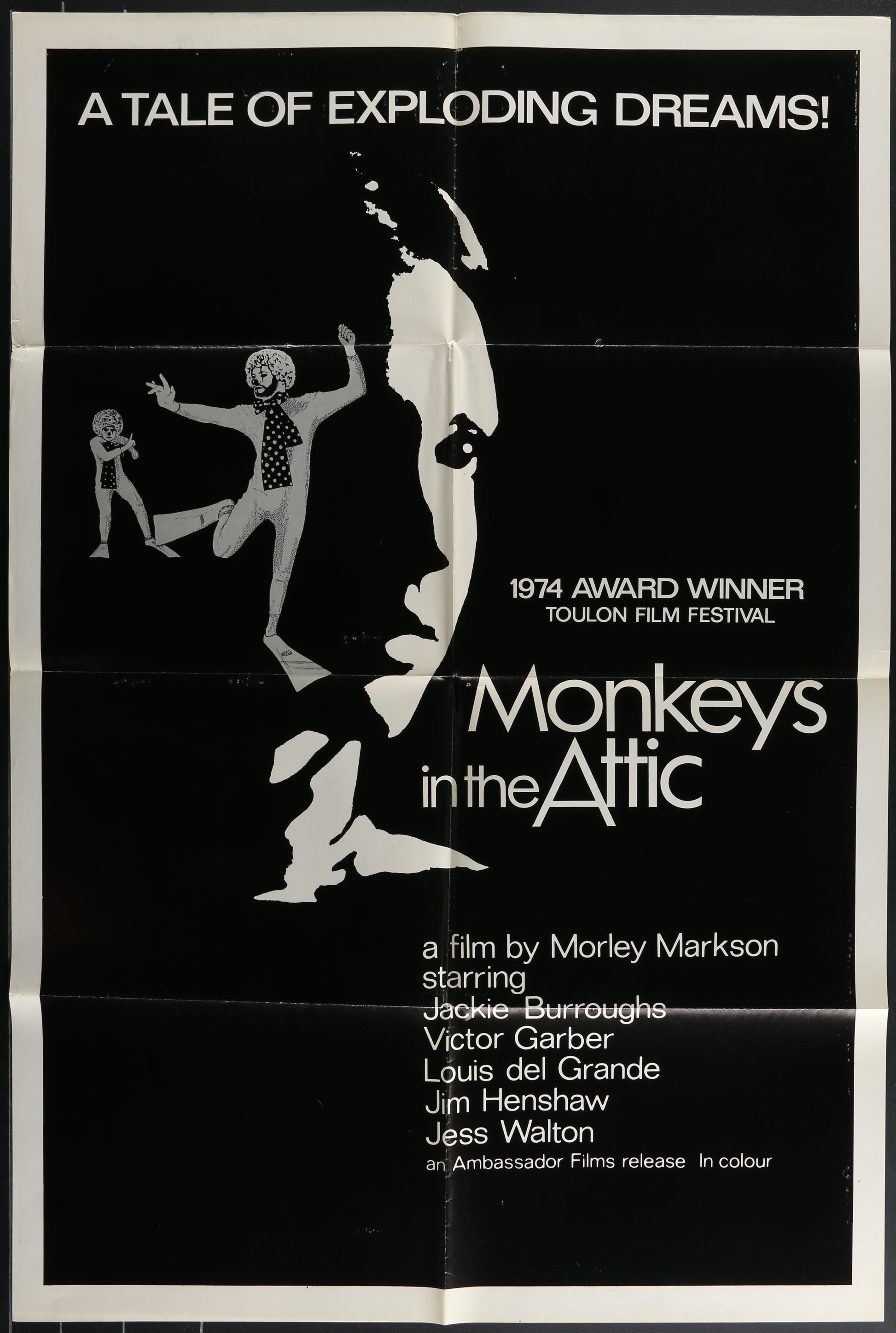 Vintage style black and white movie poster for 'Monkeys In The Attic' featuring a man and a woman in dramatic poses against a black background, with the text '1974 TAKE ONE FILM FESTIVAL AWARD WINNER' at the bottom.