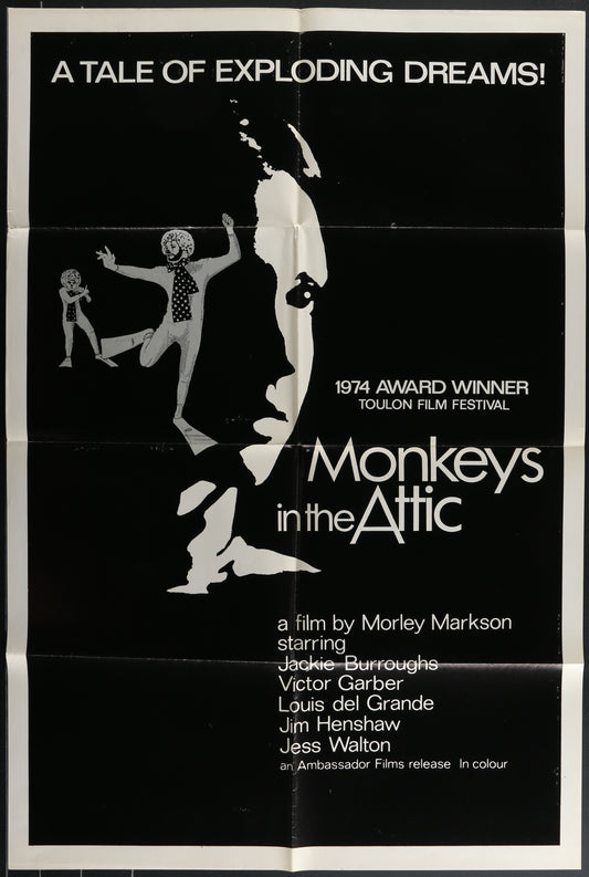 Vintage style black and white movie poster for 'Monkeys In The Attic' featuring a man and a woman in dramatic poses against a black background, with the text '1974 TAKE ONE FILM FESTIVAL AWARD WINNER' at the bottom.