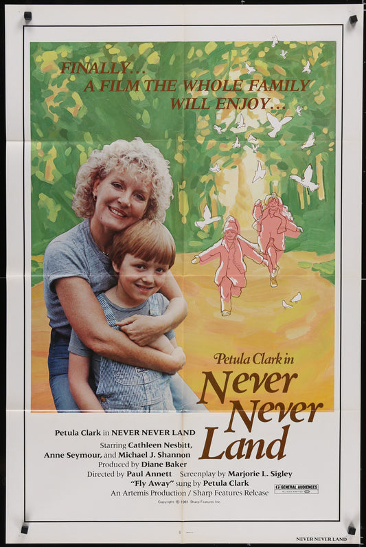 Vintage movie poster featuring a woman embracing a child outdoors, with a forest and birds in the background. The movie is titled 'NEVER NEVER LAND' and features an image of a woman and a child.