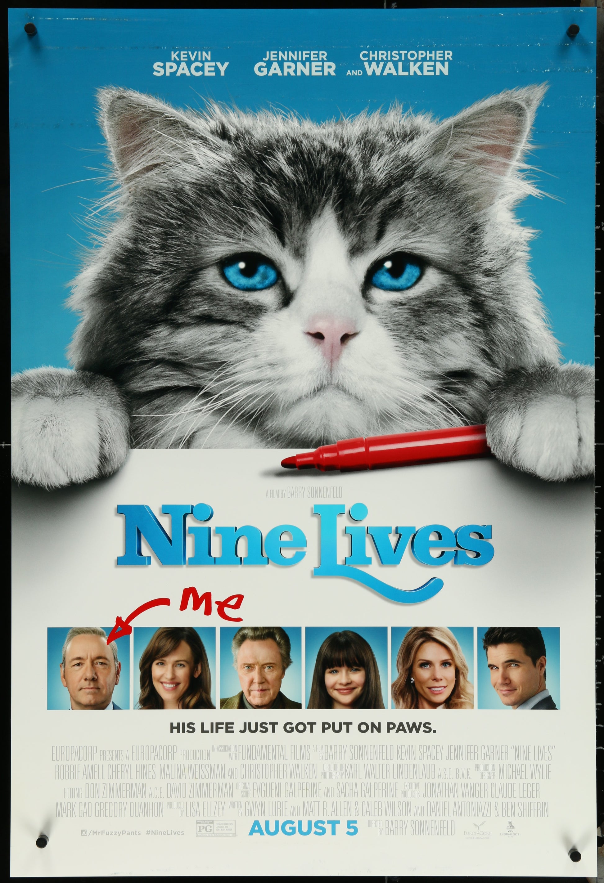 Movie poster for 'Nine Lives' featuring a cat with blue eyes holding a red pen.