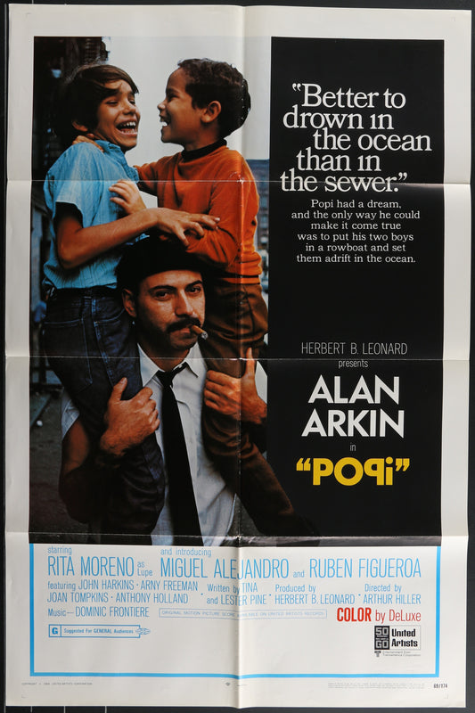 Vintage one-sheet movie poster for 'Popi' featuring two male figures embracing and a third figure looking towards the ocean, with the text 'DROWNED IN THE OCEAN, LOST IN THE SEWER' and the film's title 'POPI'.