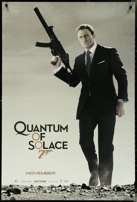 Original US one-sheet movie poster for Quantum of Solace (2008) featuring a man with a gun in a suit, indicating a James Bond film.