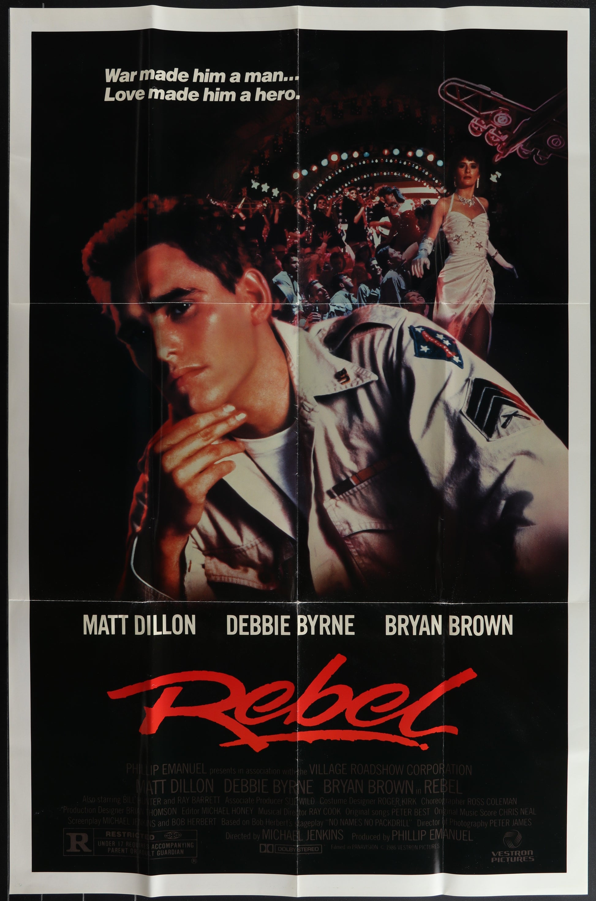 Vintage movie poster for 'Rebel' featuring a man in a military uniform with the text 'Matt Dillon' and the title 'REBEL' prominently displayed.