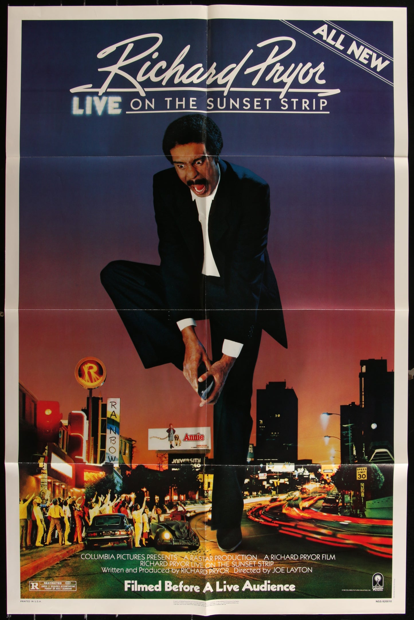 Vintage movie poster for 'Richard Pryor Live On The Sunset Strip' featuring an image of Richard Pryor in a city setting at dusk, with a sign for 'Sunset Strip' in the background.