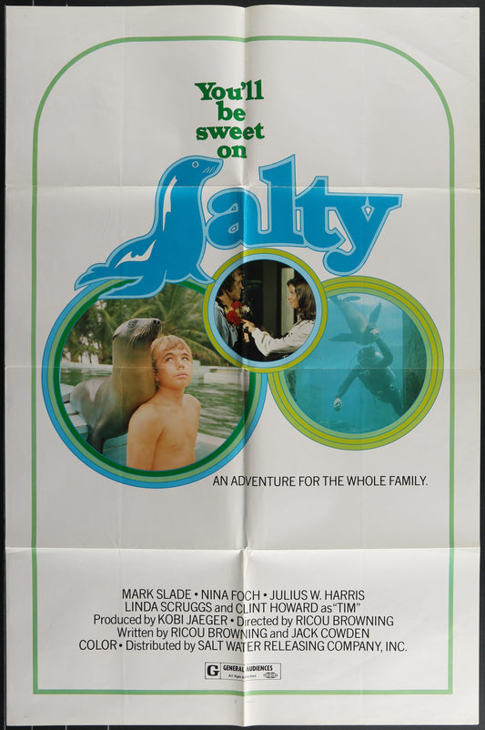 Vintage folded movie poster for 'Salty' featuring images of a boy with a seal and a seal cub, indicating an adventure-family theme.