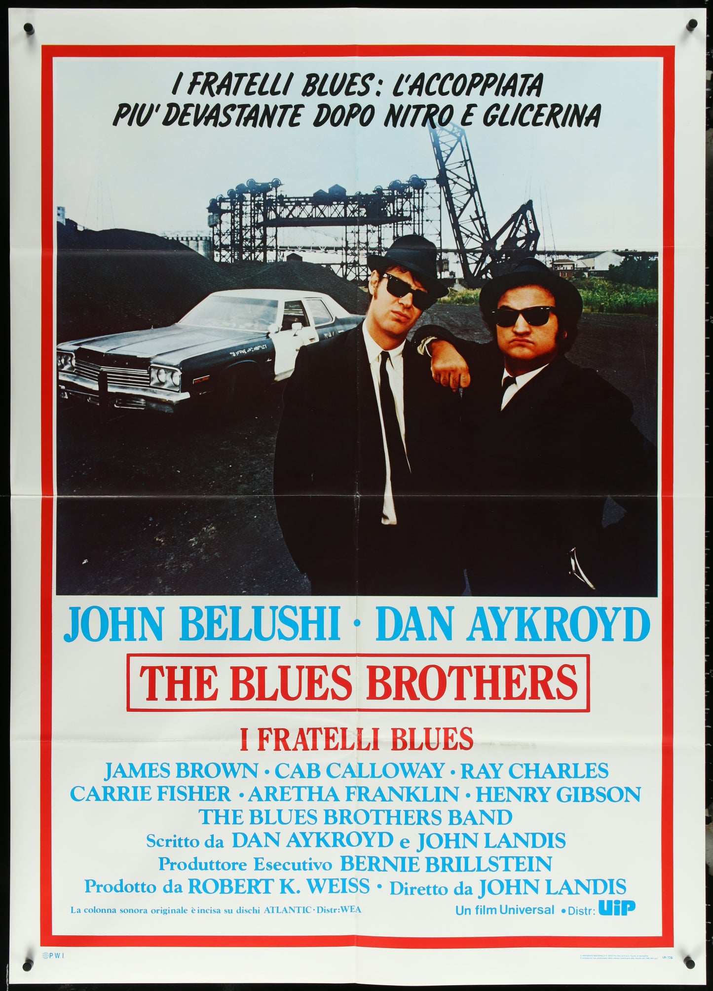 Italian one-panel movie poster for The Blues Brothers featuring images of John Belushi and Dan Aykroyd with a red and white color scheme.