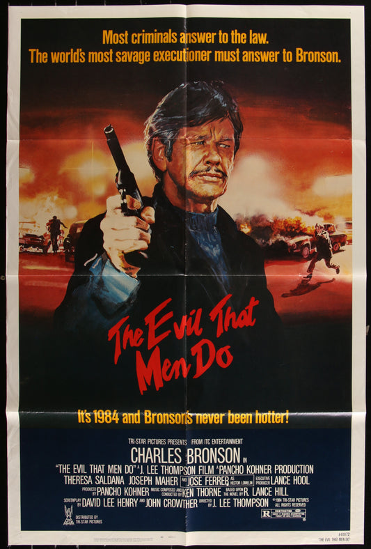 Original US one sheet movie poster for 'The Evil That Men Do' featuring a man with a gun, predominantly black and red tones, with the film title displayed.