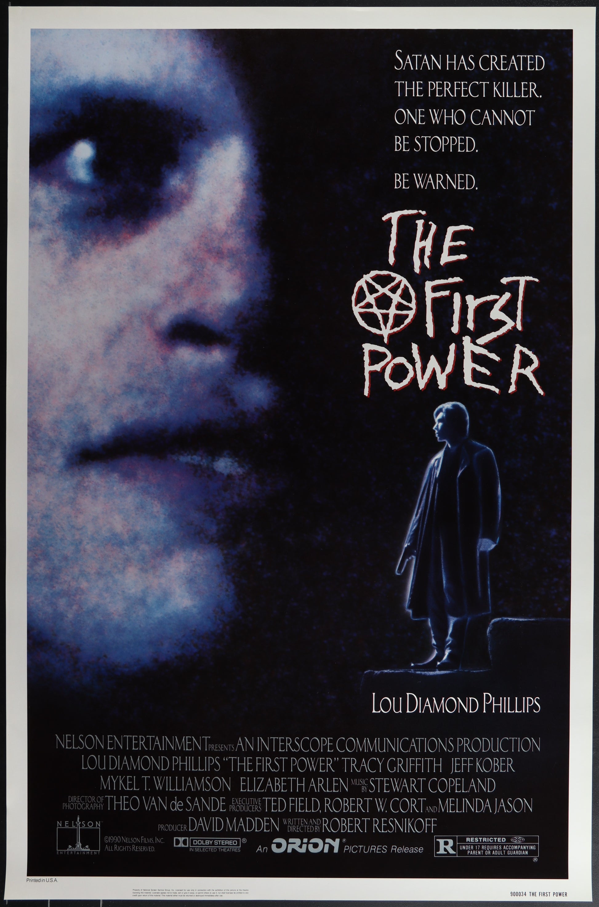 The image displays a vintage 1990 original US one sheet movie poster for "The First Power," a horror thriller directed by Robert Resnikoff and starring Lou Diamond Phillips. The poster features a striking depiction of Lou Diamond Phillips' character with a dark, ominous background that foreshadows the movie's suspenseful and frightening elements.