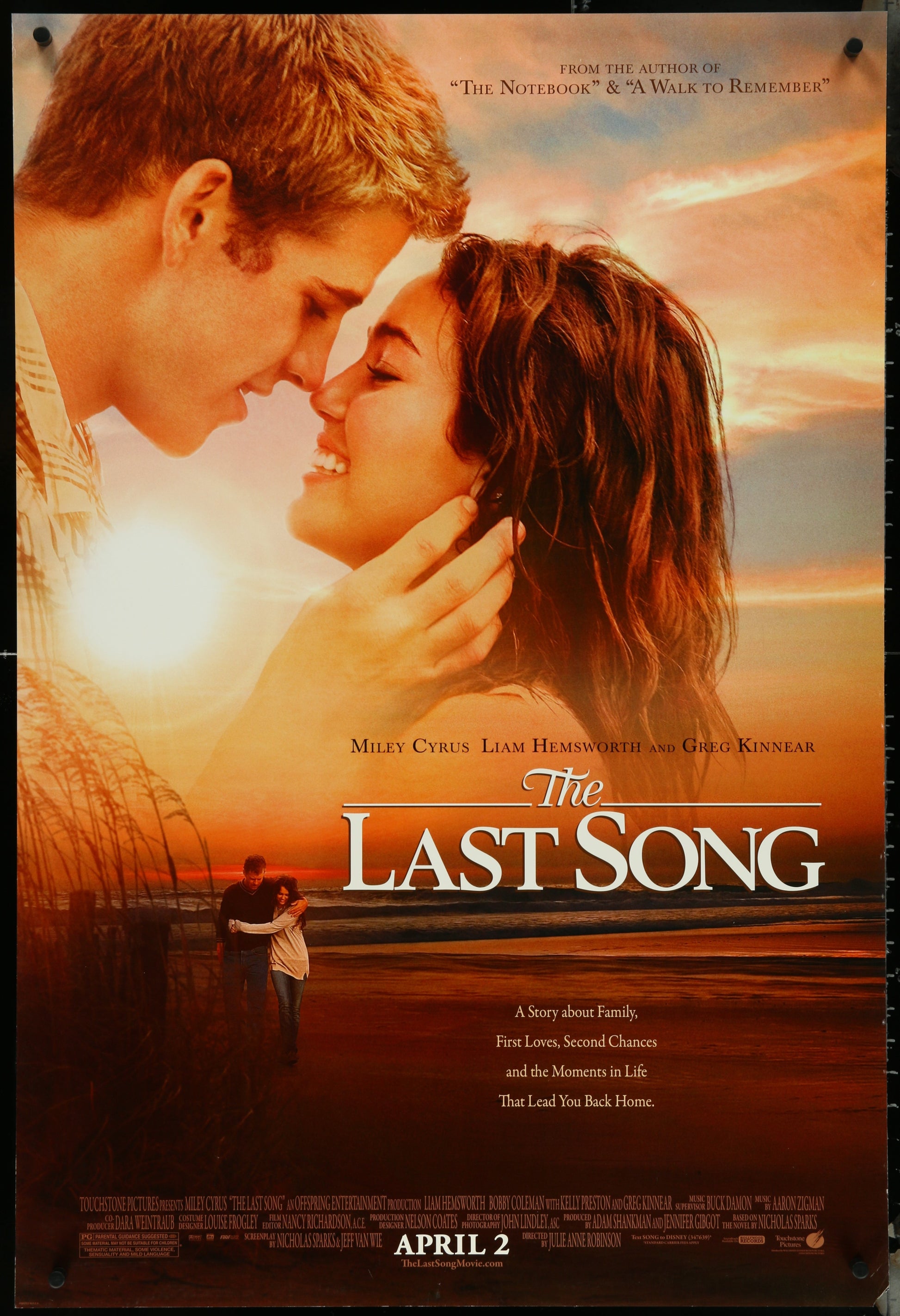 Movie poster for 'The Last Song' featuring a couple embracing on a beach.