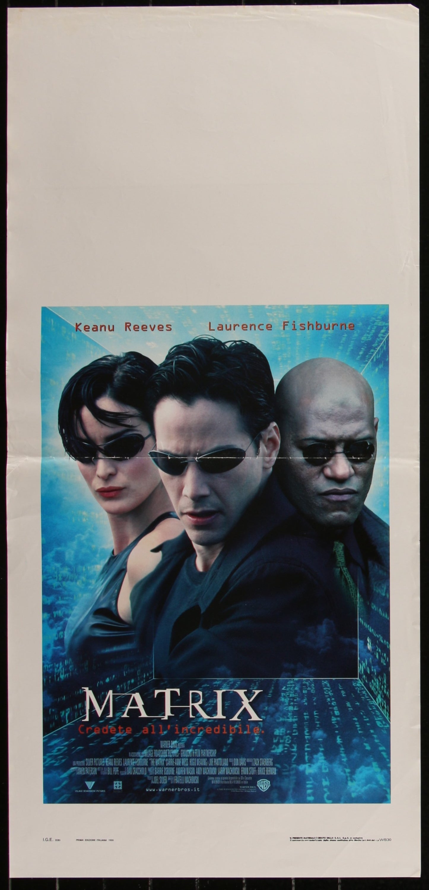 Original Italian movie poster for The Matrix featuring characters from the film with a blue and black color scheme.