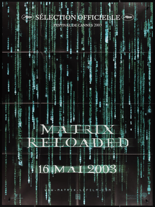 A one-panel movie poster for The Matrix Reloaded (2003) featuring a black background with green neon lines and text, indicating selection for official display at Cannes Film Festival.