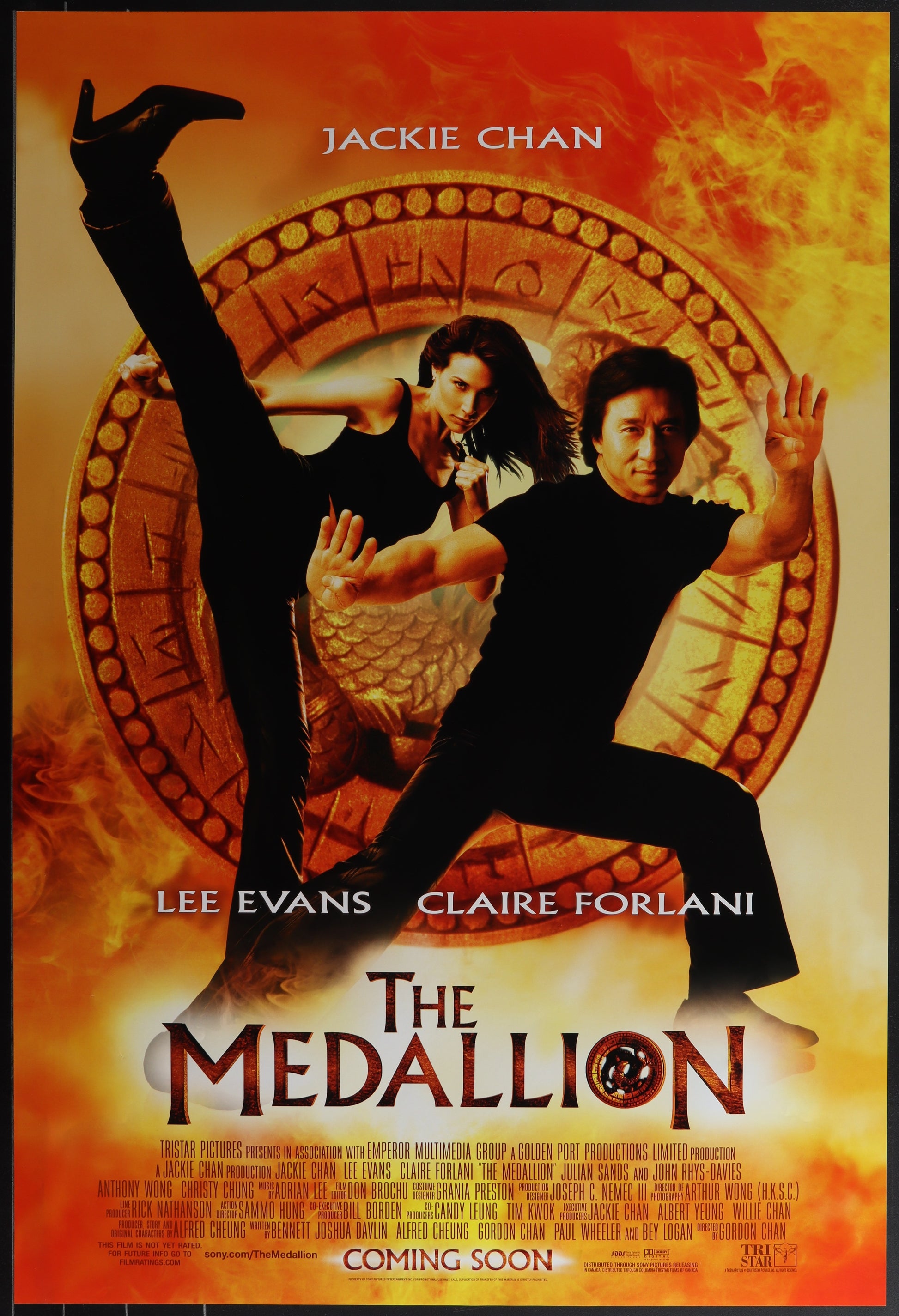 Movie poster for 'The Medallion' featuring Jackie Chan and Claire Forlani with a large medallion in the background.