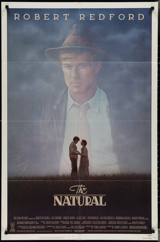 Original one-sheet movie poster for the 1984 baseball drama 'The Natural', featuring Robert Redford, with visible signs of wear such as folding and marking around the border.
