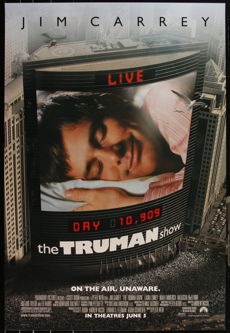 Original US one-sheet movie poster for The Truman Show featuring an image of Jim Carrey and Laura Linney with a cityscape background, indicating it's a film poster.